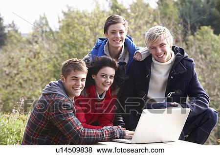 Stock Photo - Students with laptop computer. Fotosearch