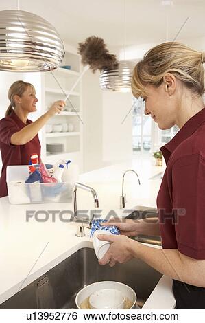 Team Of Commercial Cleaners Working In Domestic Kitchen View Large Photo Image Stock Photograph - Team Of Commercial Cleaners Working In Domestic Kitchen. Fotosearch
