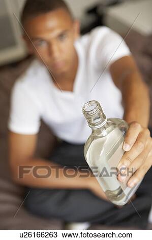 Teenage Boy Lying In Bedroom Drinking View Large Photo Image Stock Image - Teenage Boy Lying In Bedroom Drinking. Fotosearch