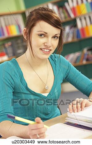 Teenage Female Student In Working In Classroom View Large Photo Image Stock Photo - Teenage Female Student In Working In Classroom. Fotosearch