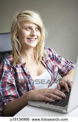 Teenage Girl Using Laptop At Home View Large Photo Image Stock Photograph - Teenage Girl Using Laptop At Home. Fotosearch