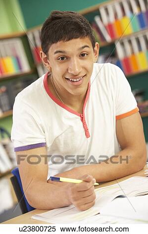 Teenage Male Student In Working In Classroom View Large Photo Image Stock Photography - Teenage Male Student In Working In Classroom. Fotosearch