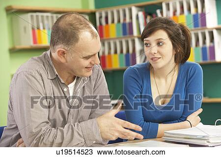 Teenage Student In Classroom With Tutor View Large Photo Image Stock Image - Teenage Student In Classroom With Tutor. Fotosearch