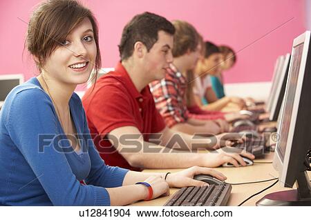 Teenage Students In IT Class Using Computers In Classroom View Large Photo Image Picture - Teenage Students In IT Class Using Computers In Classroom. Fotosearch