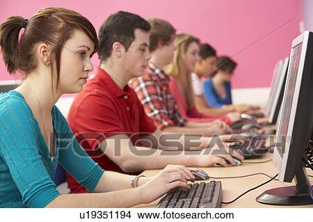 Teenage Students In IT Class Using Computers In Classroom View Large Photo Image Picture - Teenage Students In IT Class Using Computers In Classroom. Fotosearch