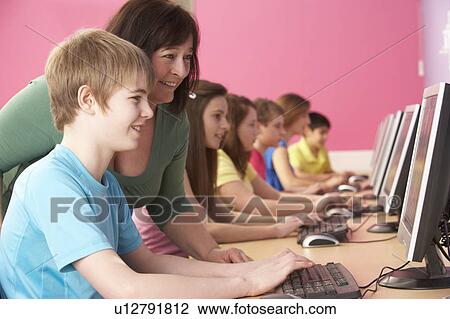Teenage Students In IT Class Using Computers In Classroom With T View Large Photo Image Stock Image - Teenage Students In IT Class Using Computers In Classroom With T. Fotosearch
