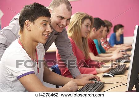Teenage Students In IT Class Using Computers In Classroom With T View Large Photo Image Stock Image - Teenage Students In IT Class Using Computers In Classroom With T. Fotosearch