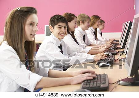 Teenage Students In IT Class Using Computers In Classroom View Large Photo Image Stock Photo - Teenage Students In IT Class Using Computers In Classroom. Fotosearch