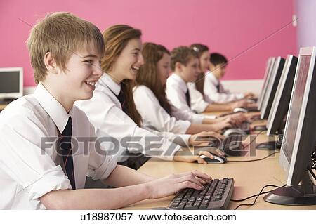 Teenage Students In IT Class Using Computers In Classroom View Large Photo Image Stock Photo - Teenage Students In IT Class Using Computers In Classroom. Fotosearch