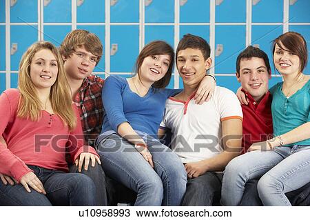 Teenage Students Relaxing By Lockers In School View Large Photo Image Stock Image - Teenage Students Relaxing By Lockers In School. Fotosearch