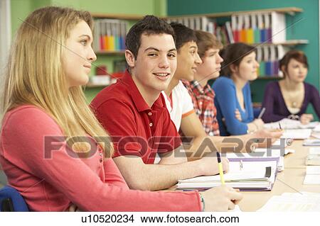 Teenage Students Studying In Classroom View Large Photo Image Picture - Teenage Students Studying In Classroom. Fotosearch