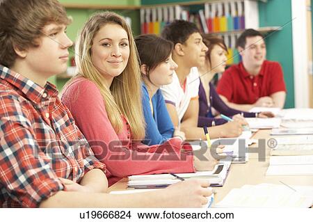 Teenage Students Studying In Classroom View Large Photo Image Picture - Teenage Students Studying In Classroom. Fotosearch