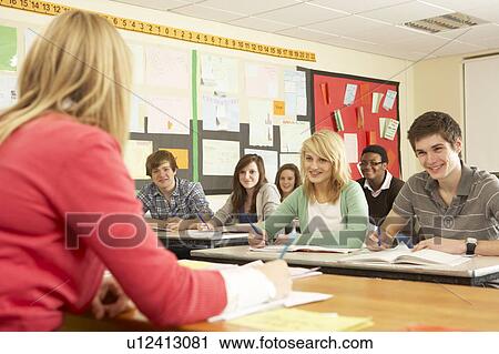 Teenage Students Studying In Classroom With Teacher View Large Photo Image Stock Image - Teenage Students Studying In Classroom With Teacher. Fotosearch