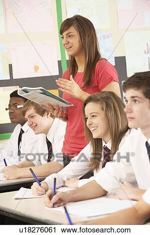 Teenage Students Studying In Classroom With Teacher View Large Photo Image Stock Image - Teenage Students Studying In Classroom With Teacher. Fotosearch