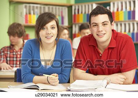 Teenage Students Studying In Classroom View Large Photo Image Stock Image - Teenage Students Studying In Classroom. Fotosearch