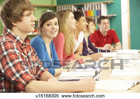 Stock Photography - Teenage Students Studying In Classroom. Fotosearch