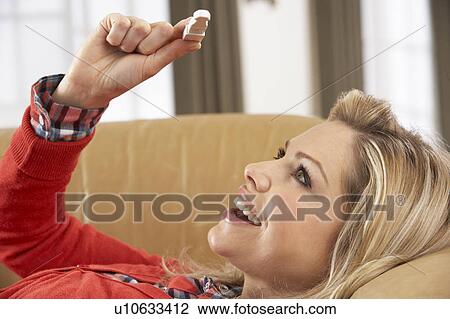 Woman Looking At Result Of Home Pregnancy Test Kit View Large Photo Image Stock Image - Woman Looking At Result Of Home Pregnancy Test Kit. Fotosearch