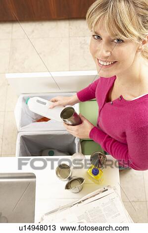 Woman Recyling Waste At Home View Large Photo Image Stock Image - Woman Recyling Waste At Home. Fotosearch
