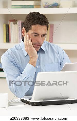 Worried Looking Man Working From Home Using Laptop View Large Photo Image Stock Image - Worried Looking Man Working From Home Using Laptop. Fotosearch