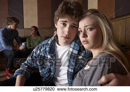 Stock Image - Worried young couple. Fotosearch