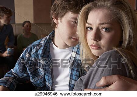 Stock Photograph - Worried young couple. Fotosearch