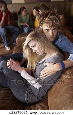 Stock Photography - Worried young couple. Fotosearch