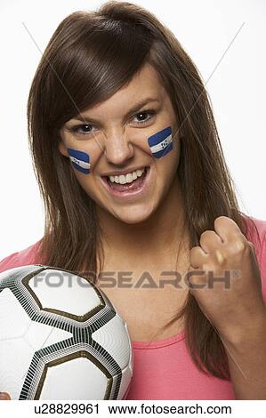 Stock Image - Young Female Football Fan With Honduran Flag Painted On Face. Fotosearch
