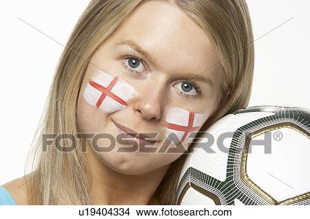 Picture - Young Female Football Fan With St Georges Flag Painted On Face. Fotosearch