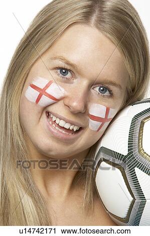 Stock Image - Young Female Football Fan With St Georges Flag Painted On Face. Fotosearch