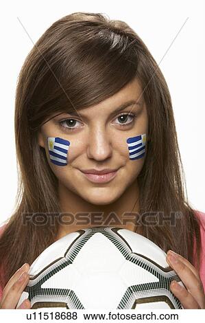 Young Female Football Fan With Uruguayan Flag Painted On Face View Large Photo Image Stock Photo - Young Female Football Fan With Uruguayan Flag Painted On Face. Fotosearch