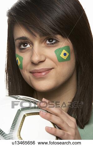 Young Female Football Fan With Brazilian Flag Painted On Face View Large Photo Image Stock Photograph - Young Female Football Fan With Brazilian Flag Painted On Face. Fotosearch