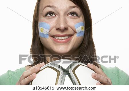 Young Female Football Fan With Argentinian Flag Painted On Face View Large Photo Image Stock Photography - Young Female Football Fan With Argentinian Flag Painted On Face. Fotosearch