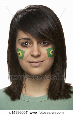 Stock Photo - Young Female Sports Fan With Brazilian Flag Painted On Face. Fotosearch