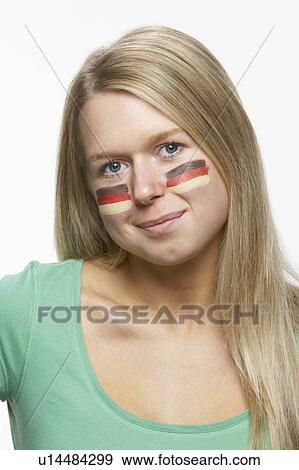 Young Female Sports Fan With German Flag Painted On Face View Large Photo Image Stock Photo - Young Female Sports Fan With German Flag Painted On Face. Fotosearch