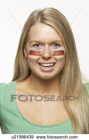 Young Female Sports Fan With German Flag Painted On Face View Large Photo Image Stock Photo - Young Female Sports Fan With German Flag Painted On Face. Fotosearch