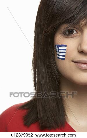 Stock Image - Young Female Sports Fan With Greek Flag Painted On Face. Fotosearch