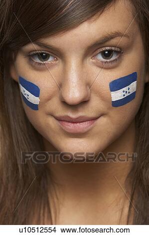 Young Female Sports Fan With Honduran Flag Painted On Face View Large Photo Image Picture - Young Female Sports Fan With Honduran Flag Painted On Face. Fotosearch
