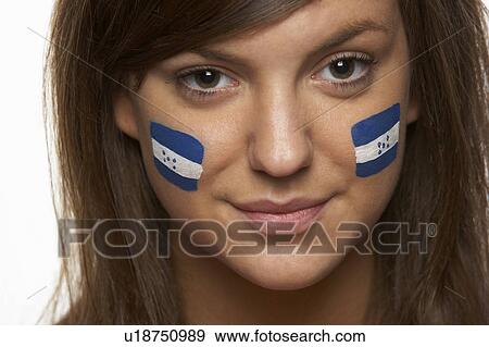 Stock Photo - Young Female Sports Fan With Honduran Flag Painted On Face. Fotosearch