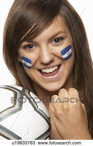 Young Female Sports Fan With Honduras Flag Painted On Face View Large Photo Image Stock Image - Young Female Sports Fan With Honduras Flag Painted On Face. Fotosearch