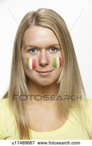 Stock Photo - Young Female Sports Fan With Italian Flag Painted On Face. Fotosearch