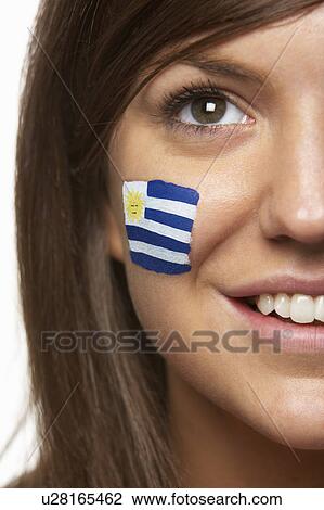 Young Female Sports Fan With Uruguayan Flag Painted On Face View Large Photo Image Stock Image - Young Female Sports Fan With Uruguayan Flag Painted On Face. Fotosearch