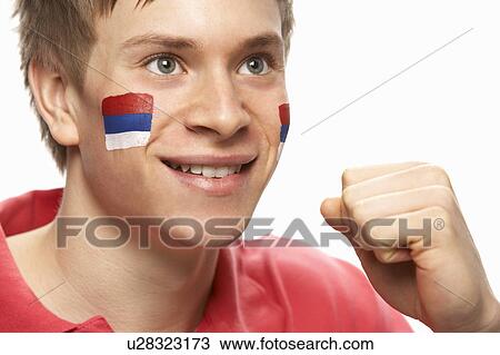 Young Male Football Fan With Serbian Flag Painted On Face View Large Photo Image Stock Image - Young Male Football Fan With Serbian Flag Painted On Face. Fotosearch