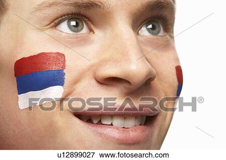 Young Male Football Fan With Serbian Flag Painted On Face View Large Photo Image Stock Photo - Young Male Football Fan With Serbian Flag Painted On Face. Fotosearch