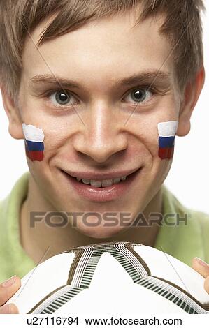 Young Male Football Fan With Slovakian Flag Painted On Face View Large Photo Image Picture - Young Male Football Fan With Slovakian Flag Painted On Face. Fotosearch