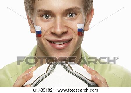 Young Male Football Fan With Slovakian Flag Painted On Face View Large Photo Image Stock Image - Young Male Football Fan With Slovakian Flag Painted On Face. Fotosearch