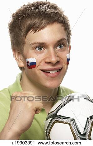 Young Male Football Fan With Slovakian Flag Painted On Face View Large Photo Image Stock Image - Young Male Football Fan With Slovakian Flag Painted On Face. Fotosearch