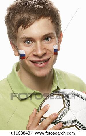 Stock Photo - Young Male Football Fan With Slovakian Flag Painted On Face. Fotosearch