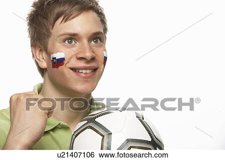 Young Male Football Fan With Slovakian Flag Painted On Face View Large Photo Image Stock Photograph - Young Male Football Fan With Slovakian Flag Painted On Face. Fotosearch