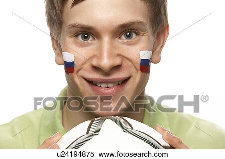Stock Photography - Young Male Football Fan With Slovakian Flag Painted On Face. Fotosearch