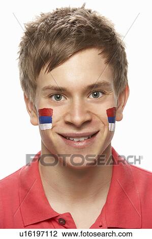 Stock Image - Young Male Sports Fan With Serbian Flag Painted On Face. Fotosearch